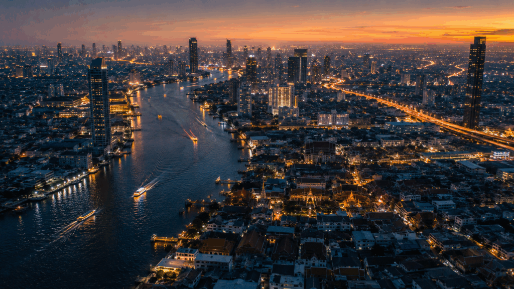 Aerial view of Bangkok and the Chao Phraya at blue hour, Thailand film production 2026